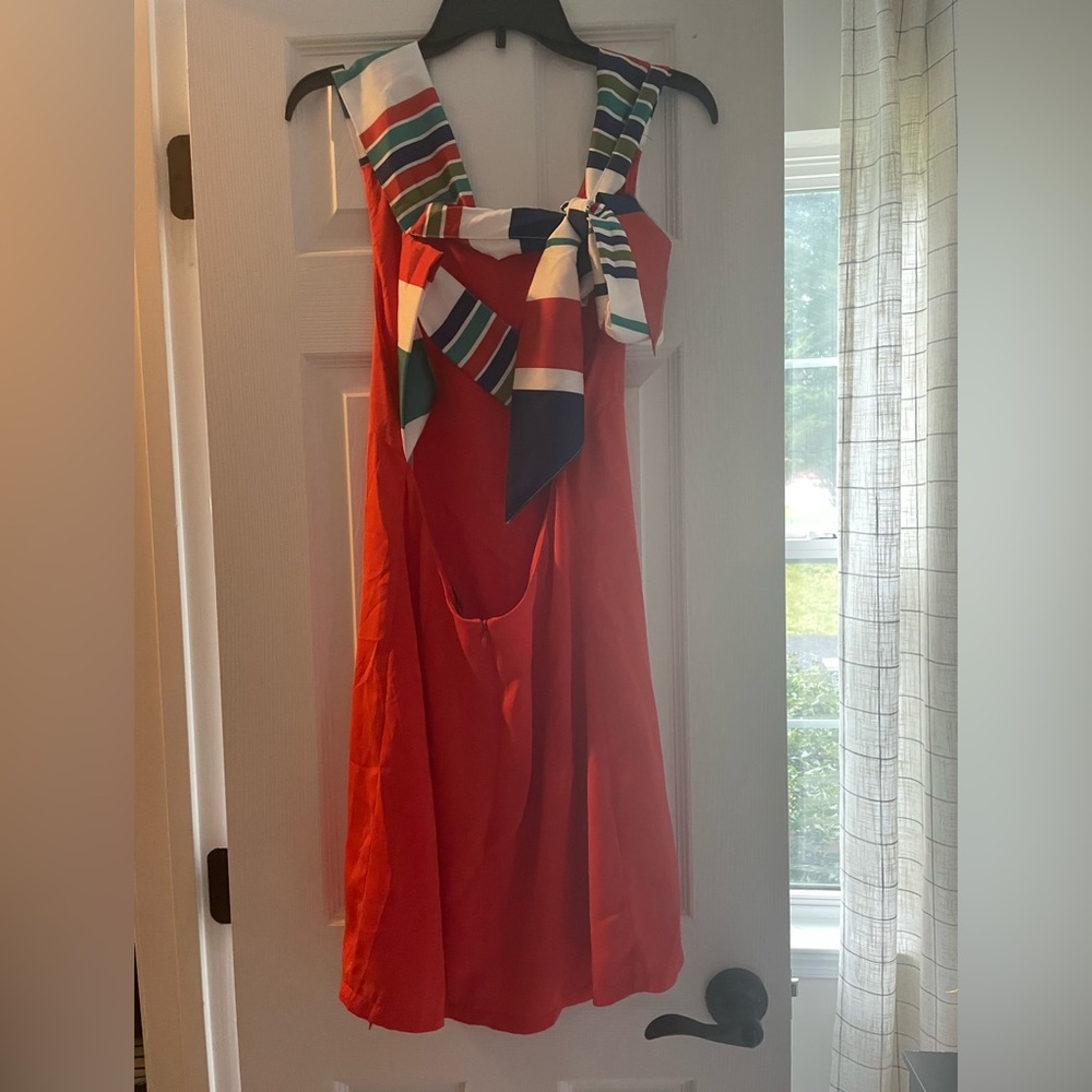 Orange shift dress with colorful ribbon back tie.